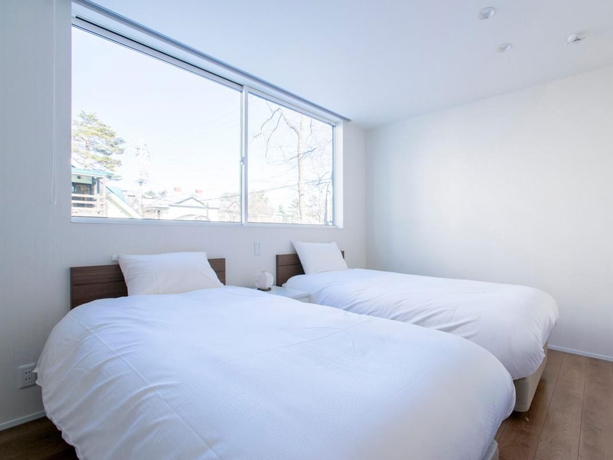White Fox Chalets bedroom in Hakuba
